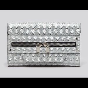 BNWT Milly hologram silver clutch